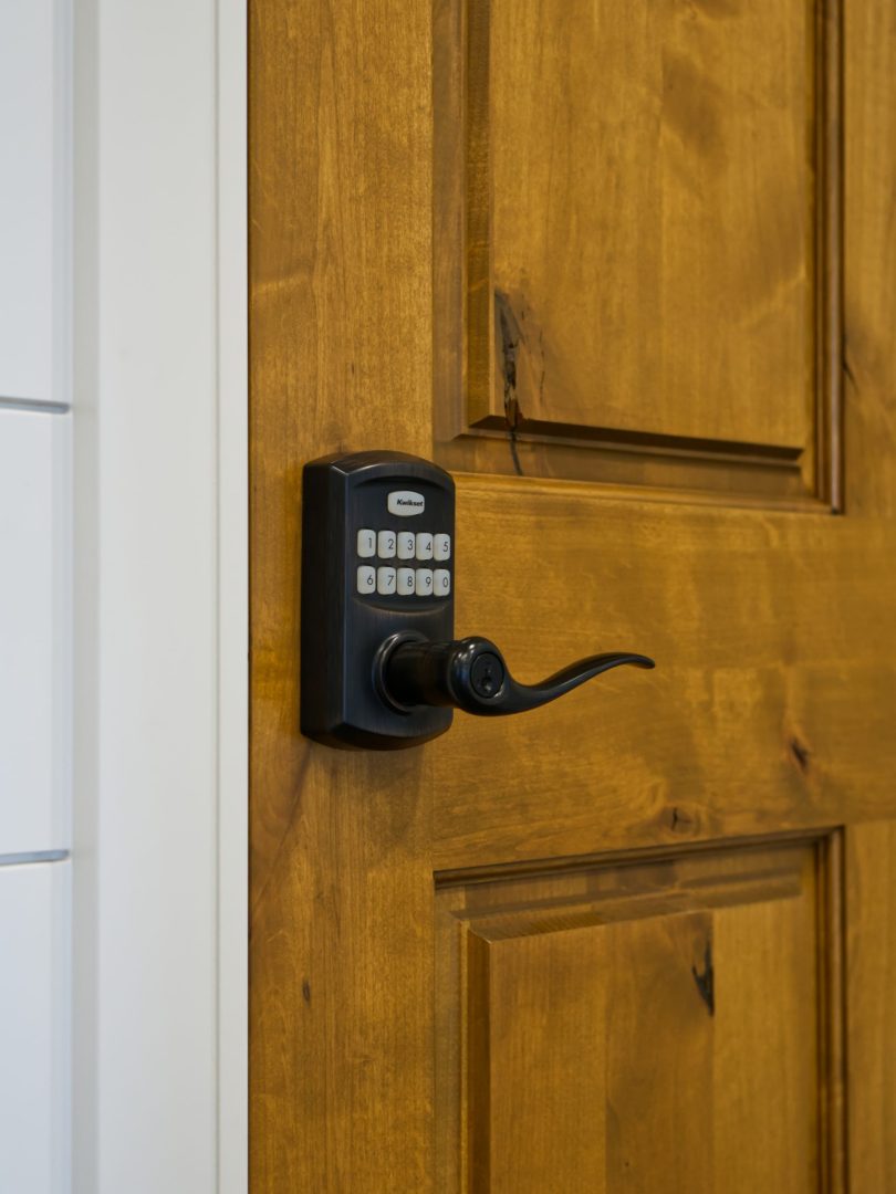 Front door with keypad door hardware
